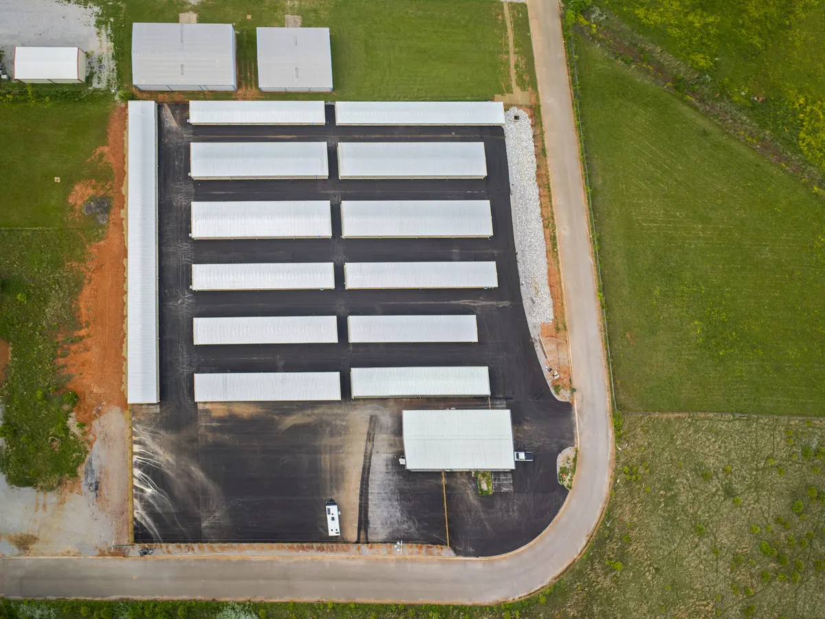 Drone photo of SB Storage on Mitch Avenue in Tuscumbia, with RVs and trailers parked inside the fence