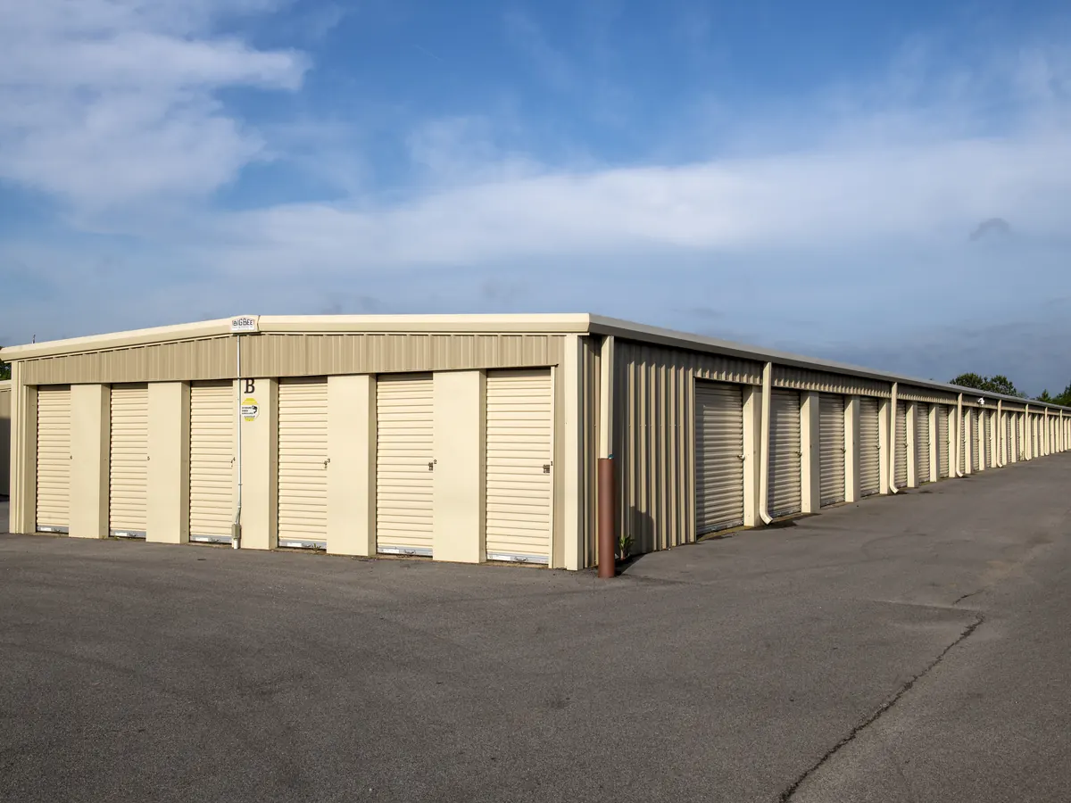 A long row of drive-up storage units